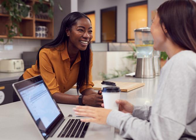 Two small business professionals discuss how they can collaborate their operations.