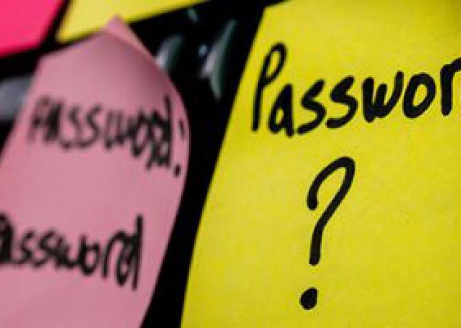password written on yellow sticky note